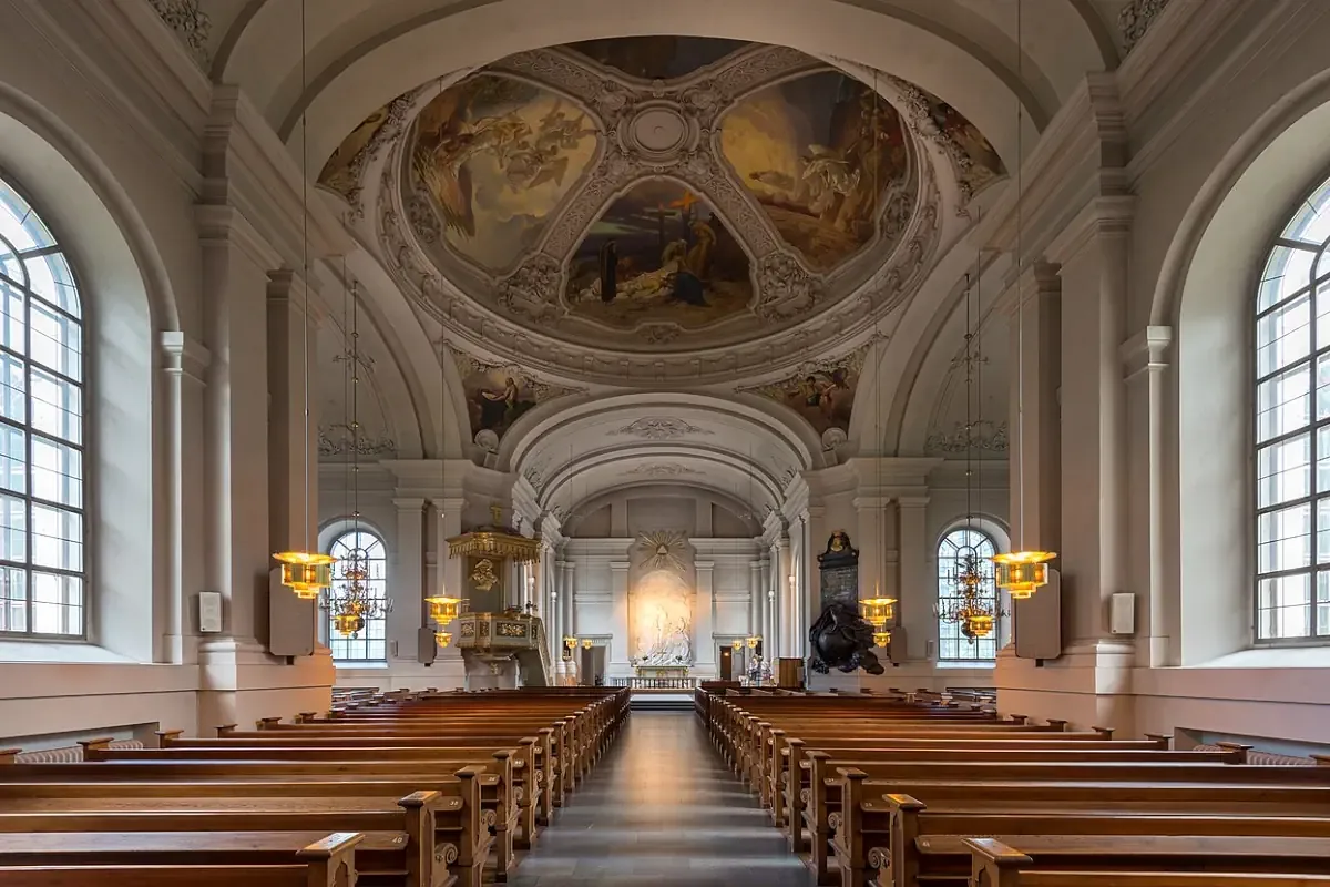 The frescoed dome and nave of Adolf Fredrik Church in Stockholm